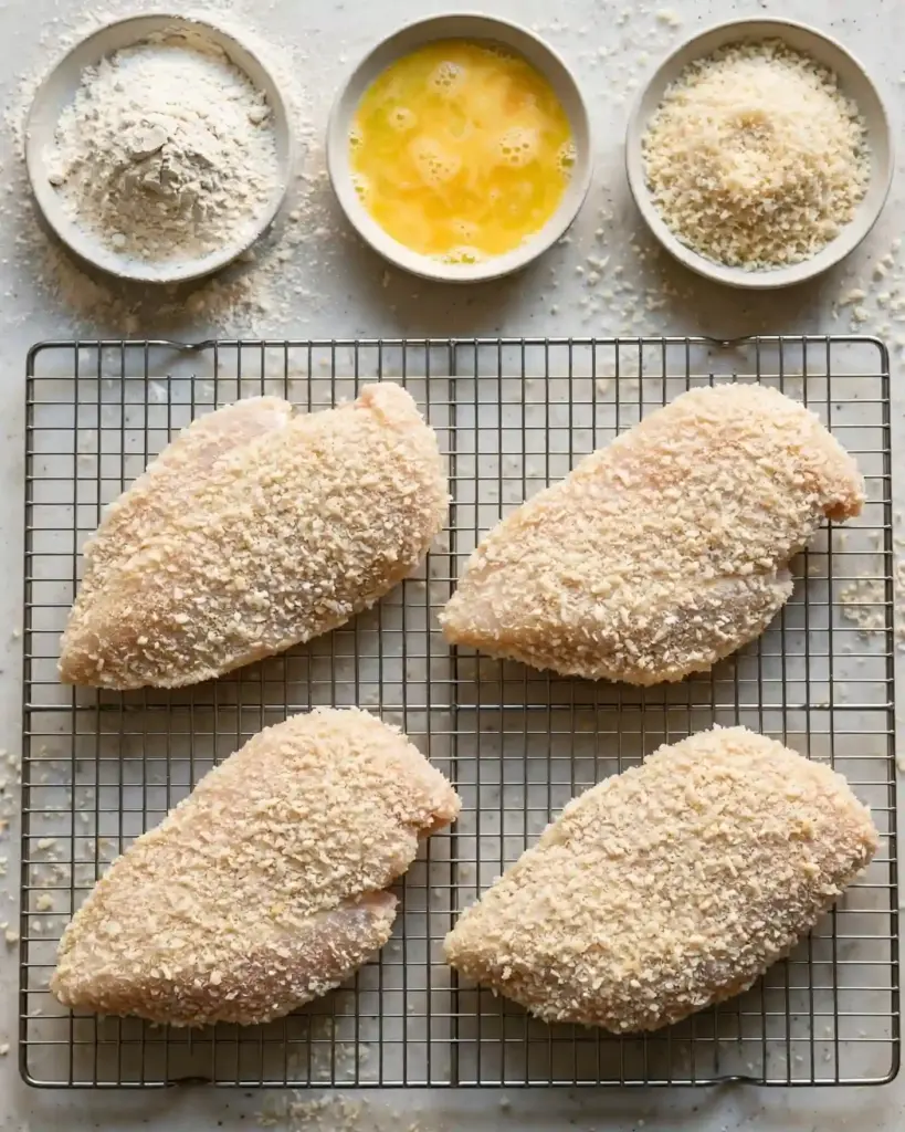 Easy Chicken Parmesan Recipe (Ready in 45 Minutes) 3 chicken parmesan recipe breaded cutlets 819x1024 1